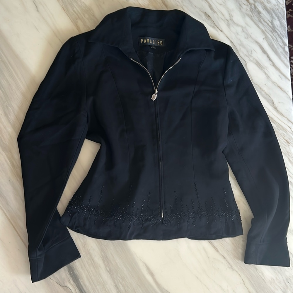 Isle of Paradise Black Fitted Blazer with Zip-Up Front and Ruffled Hem